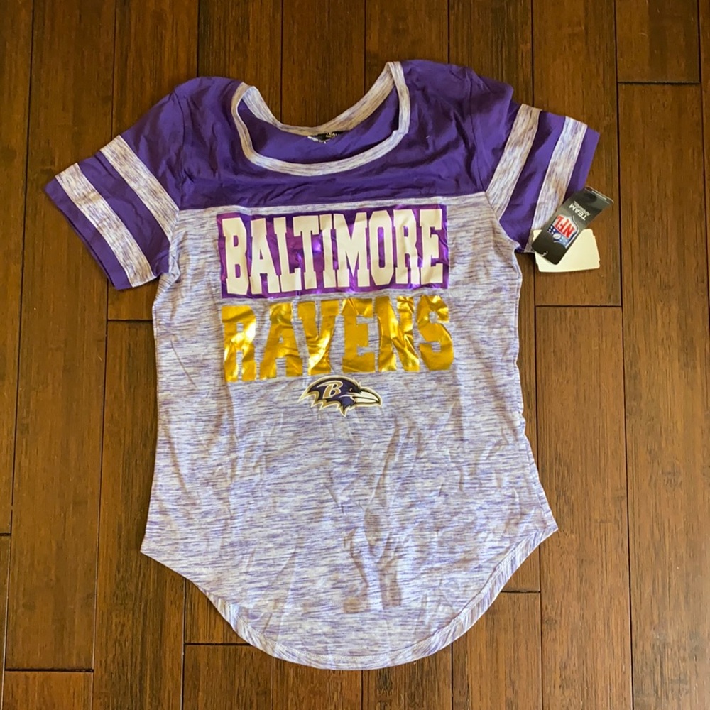 Women’s Baltimore Ravens team shirt.